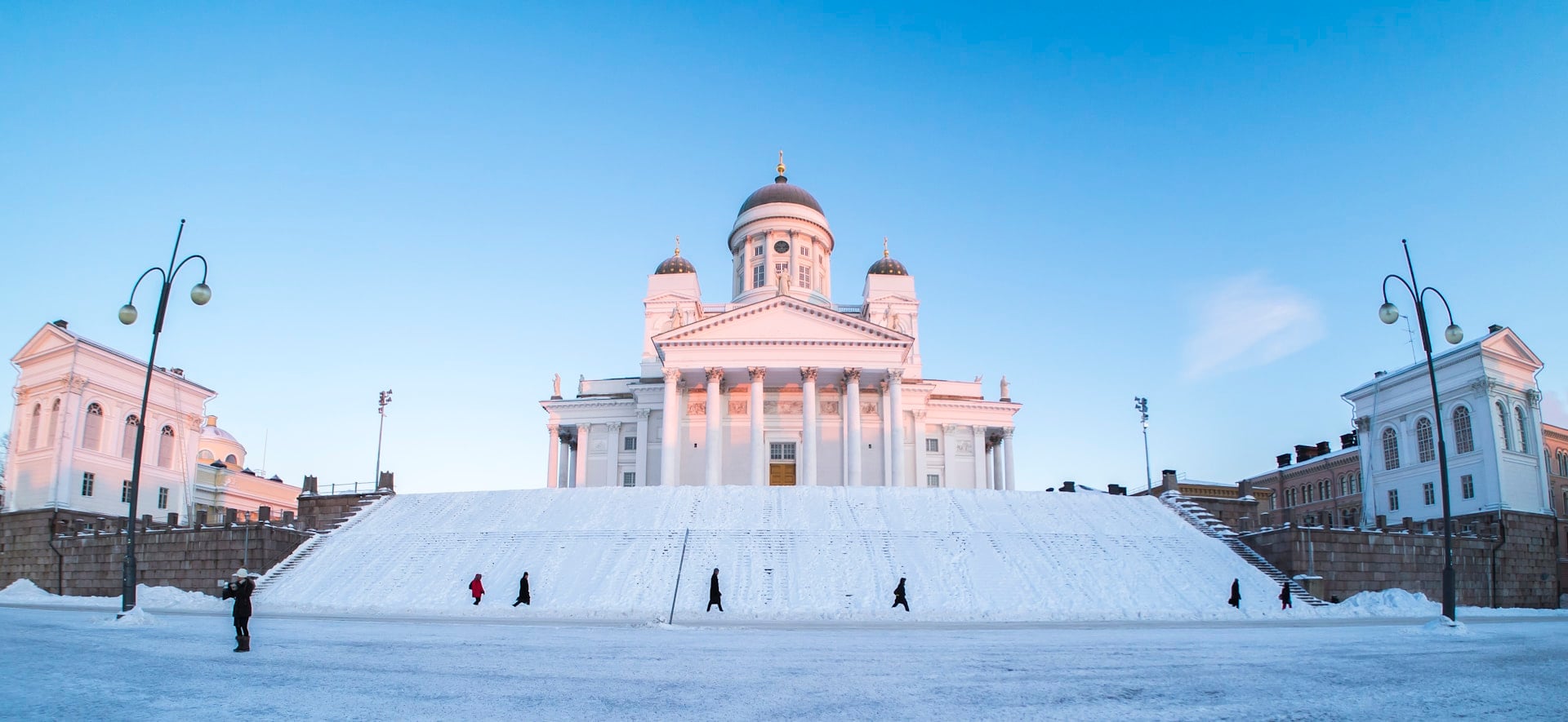 A photo of the iconic Helsinki Cathedral in Finland, seen from Senate Square during winter